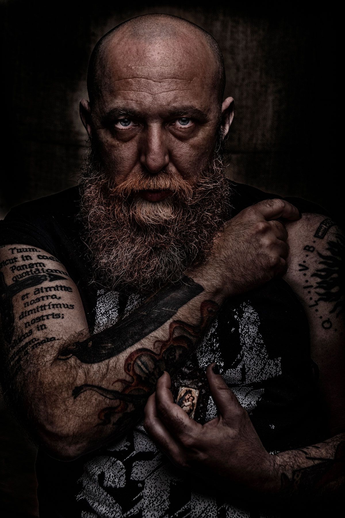 The Normand II — tattooed bearded man in dramatic low key light